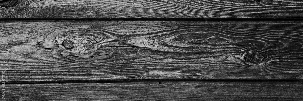 Obraz premium the background is tinted in black and grey colour of old wooden boards. mockup. banner