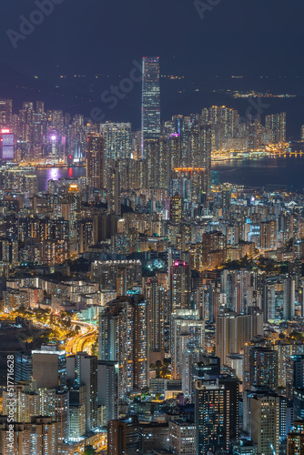 Aerial view of Hong Kong city at night © leeyiutung