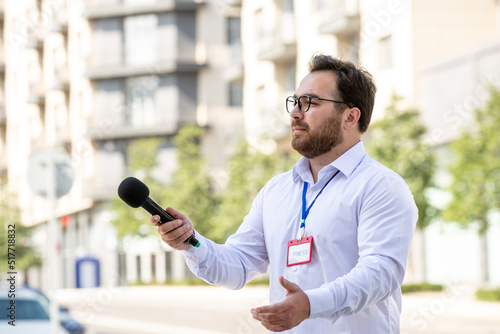 journalist professional brunette young journalist reporting news on television giving interview