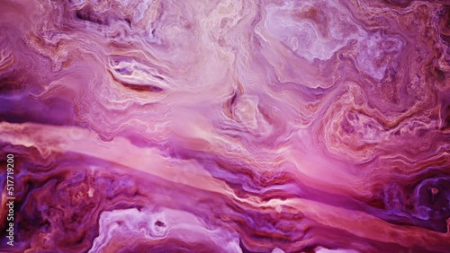 Flowing ever changing liquid crystal agate abstract time lapse, beautiful cloudy lines and folds slow moving and seamless looping. Enigmatic and relaxing background. photo