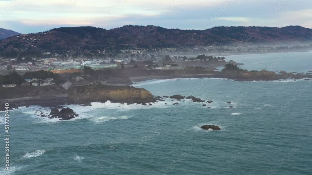 Panoramic view of Brookings, Oregon from drone over ocean. Travel Southern Oregon Coast background. Panoramic view of Brookings, Oregon from drone over ocean. Travel Southern Oregon Coast background.