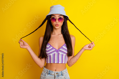 Tablou canvas Photo of charming flirty lady wear striped crop top cap arm dark eyewear send yo