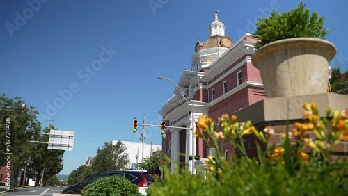 View of Berkeley County courthouse in Martinsburg, West Virginia, WV over flower bed. photo