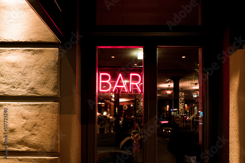Neon Bar sign at European dive bar 