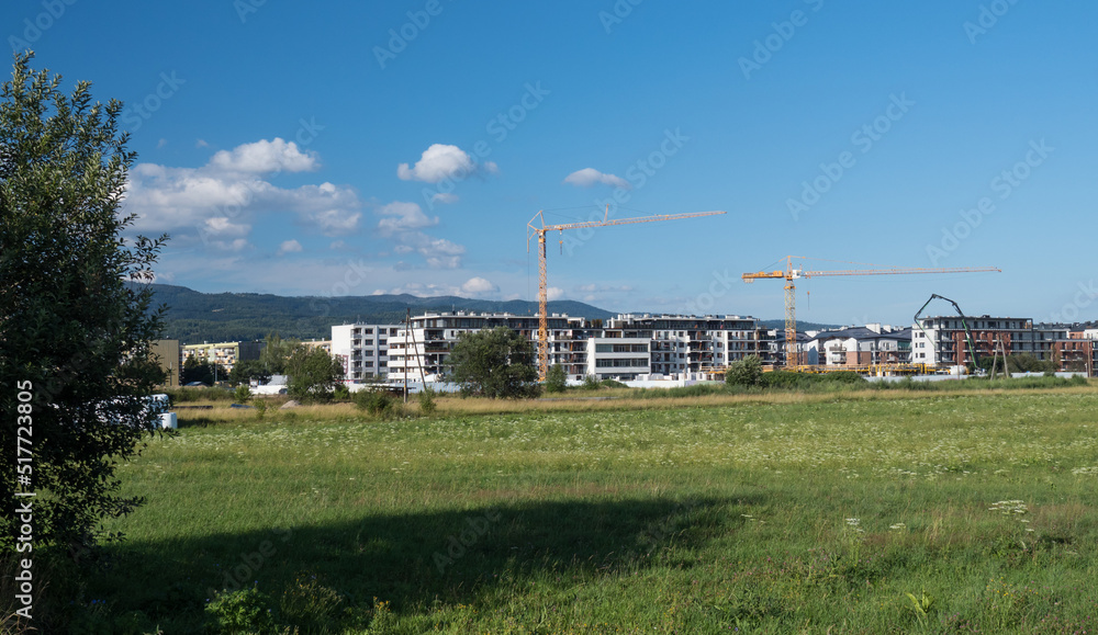 Residential construction and crane at site work Residential construction and crane at site work