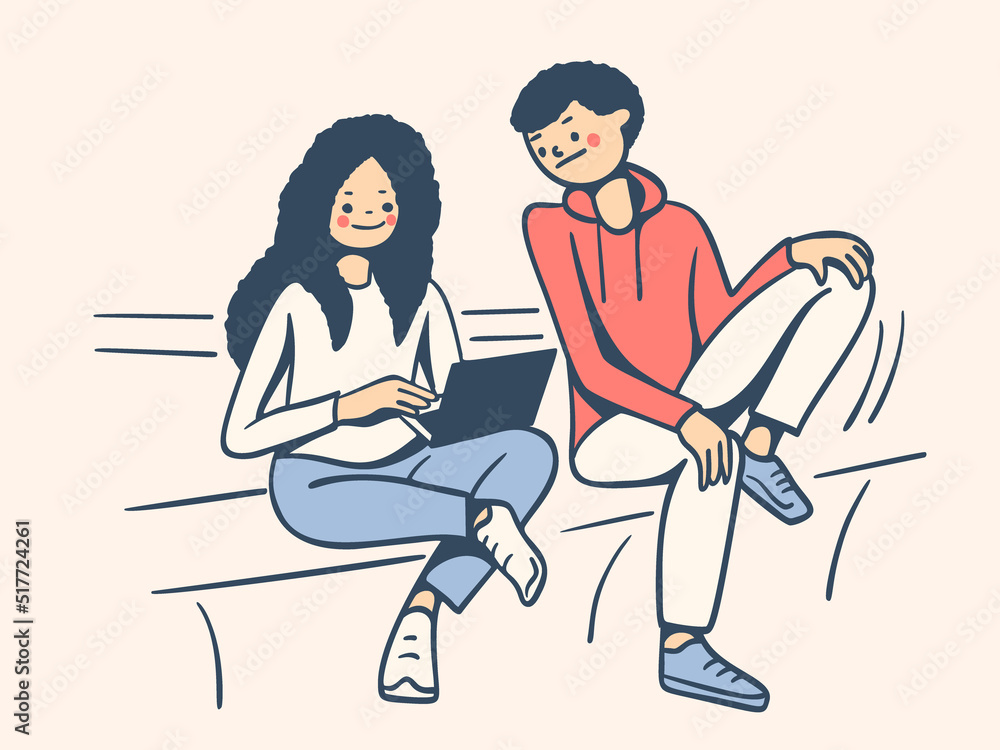 A young man and a girl with a laptop. A young man and a girl with a laptop.