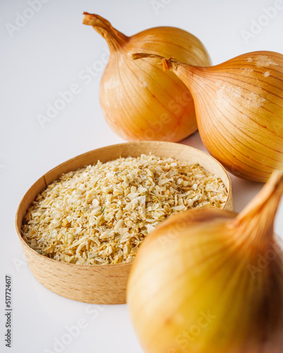 dried onions on a white acrylic background