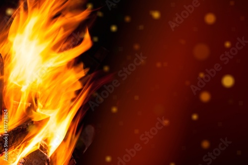 Fire abstract texture with flames on dark background.