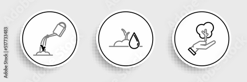Set line Tree in hand of environmental protection, Watering can with water and sprout icon. Vector