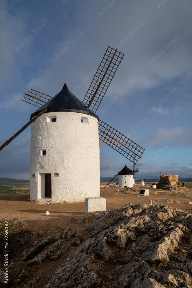 molinos de Consuegra con el castillo de la Muela al fondo, cerro Calderico, Consuegra, provincia de Toledo, Castilla-La Mancha, Spain molinos de Consuegra con el castillo de la Muela al fondo, cerro Calderico, Consuegra, provincia de Toledo, Castilla-La Mancha, Spain