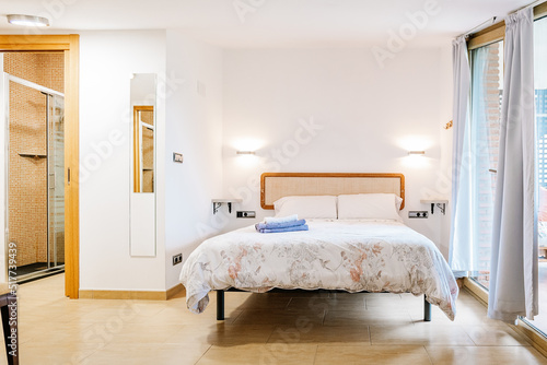 Wallpaper Mural Interior of cozy bedroom with comfortable bed and panoramic windows Torontodigital.ca