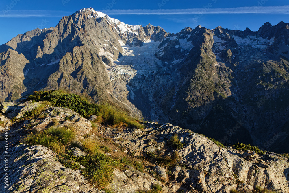 Obraz premium Sun rises on Mont-Blanc de Courtmayeur, the italian side of the famous European Mountain