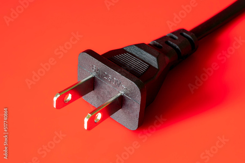 American electricity plug on red background. Copy space