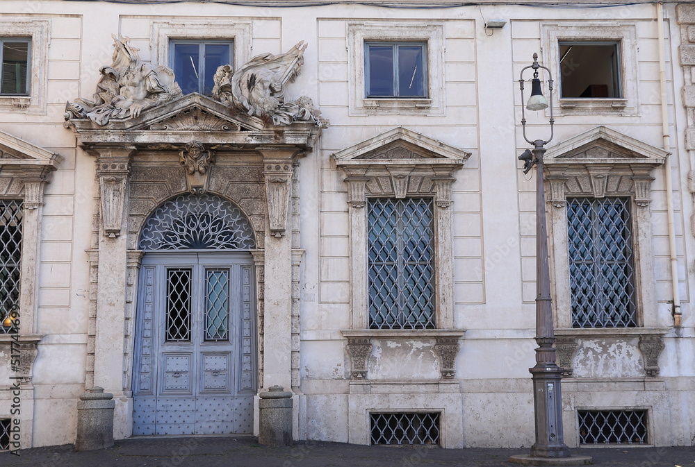 Palazzo della Consulta Building Facade with Entrance, Windows and Sculpted Details in Rome, Italy
