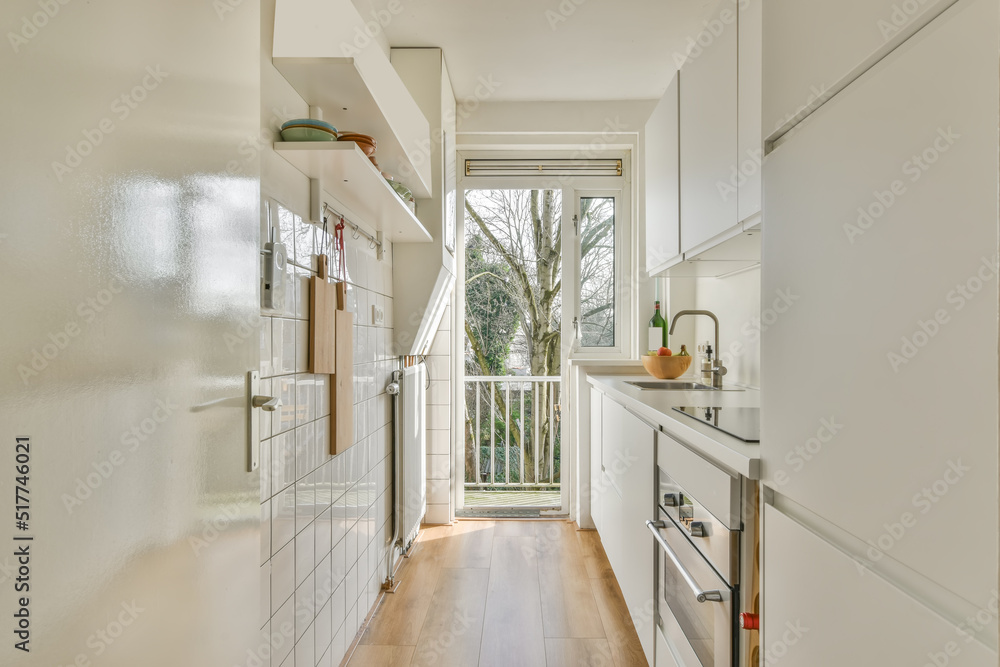 Modern kitchen with white cabinets Stock Photo | Adobe Stock