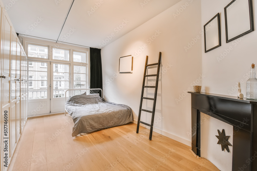 Bedroom interior with bed and wardrobe Stock Photo | Adobe Stock