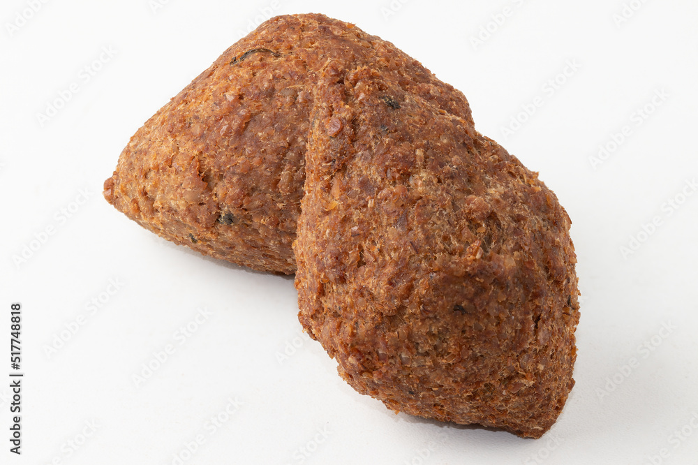 Kibbeh isolated on white background. Kibbeh isolated on white background.