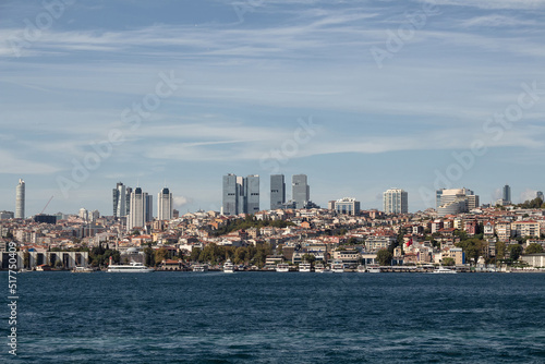 View of boats on Bosphorus, Besiktas and Levent districts on European side of Istanbul. It is a sunny summer day. © theendup