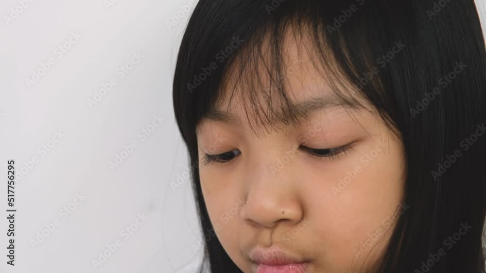 Asian child girls are addictive playing mobile phones Asian child girls are addictive playing mobile phones