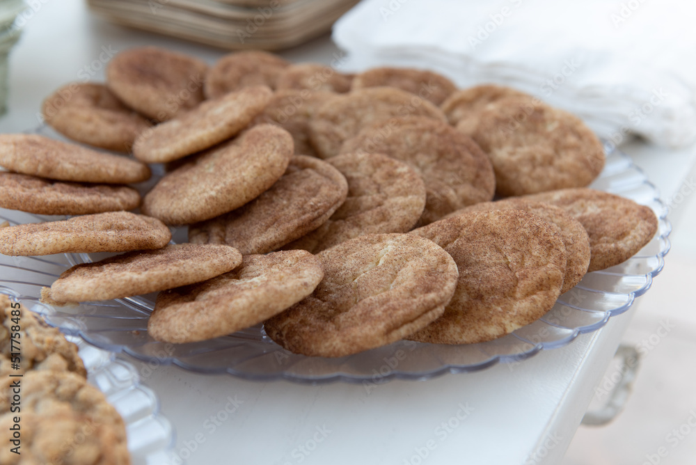 Fototapeta premium Delicious serve yourself offering of snickerdoodle cookies on a plate for all the wedding guests to eat after dinner