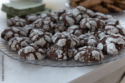 Delicious serve yourself offering of chocolate cookies on a plate for all the wedding guests to eat after dinner