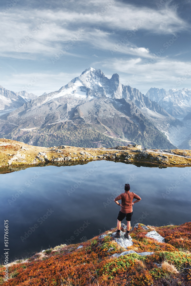 Amazing view on Monte Bianco mountains range with tourist on a foreground. Lac de Cheserys lake, Chamonix, Graian Alps. Landscape photography