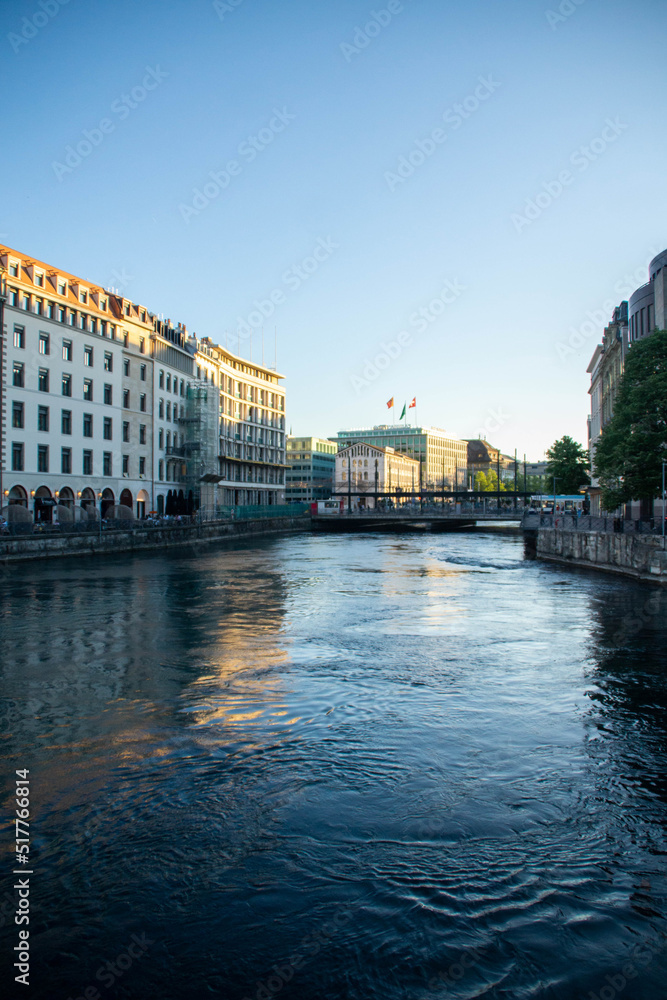 Fototapeta premium View at Geneva city over Geneva lake at sunset, Switzerland.