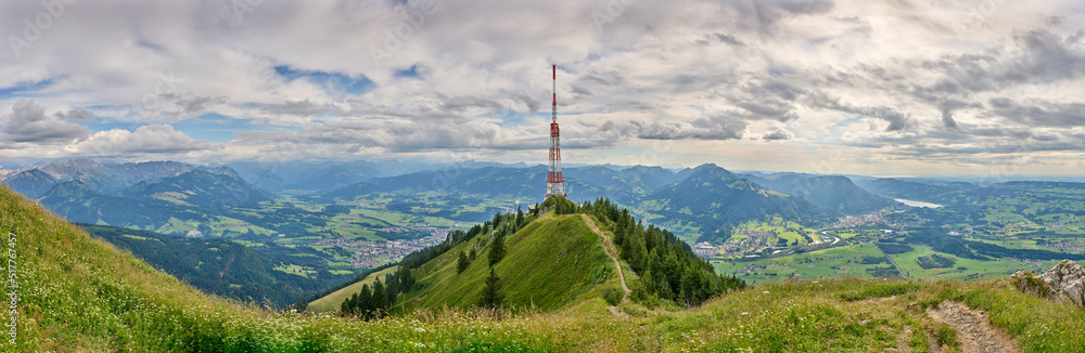 panoramic landscape view from Mount Gruenten  over the summits of the Allgaeu alps and Iller valley near Immenstadt, Bavaria, Germany