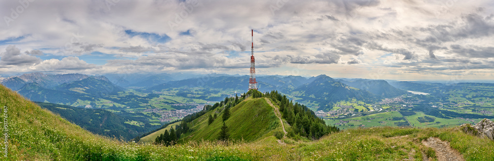 Obraz premium panoramic landscape view from Mount Gruenten over the summits of the Allgaeu alps and Iller valley near Immenstadt, Bavaria, Germany