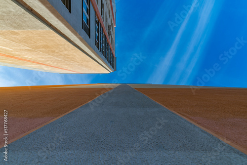 High-rise multi-storey city houses photographed with a wide-angle lens.