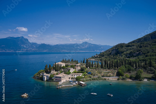 Aerial view of Punta San Vigilio, Garda. Top view of Baia delle Sirene Park. Aerial panorama of Parco San Vigilio, Lake Garda, Italy.
