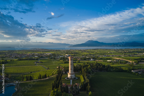 Tower of San Martino della Battaglia aerial view, Surrounded by cypresses and vineyards. Panorama of the Tower of San Martino della Battaglia on Lake Garda in Italy.