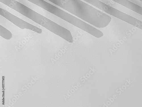 Abstrakter Hintergrund mit Schatten von oben auf einer weißen Wand