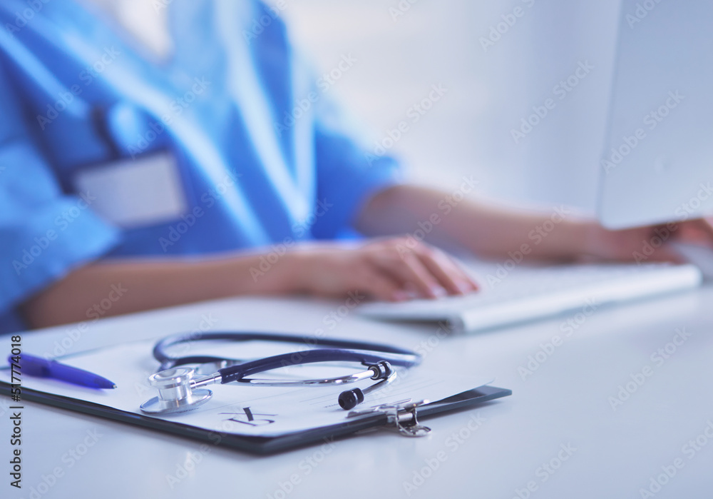 Stethoscope on desk. Doctor working in hospital. Healthcare and medical concept Stethoscope on desk. Doctor working in hospital. Healthcare and medical concept