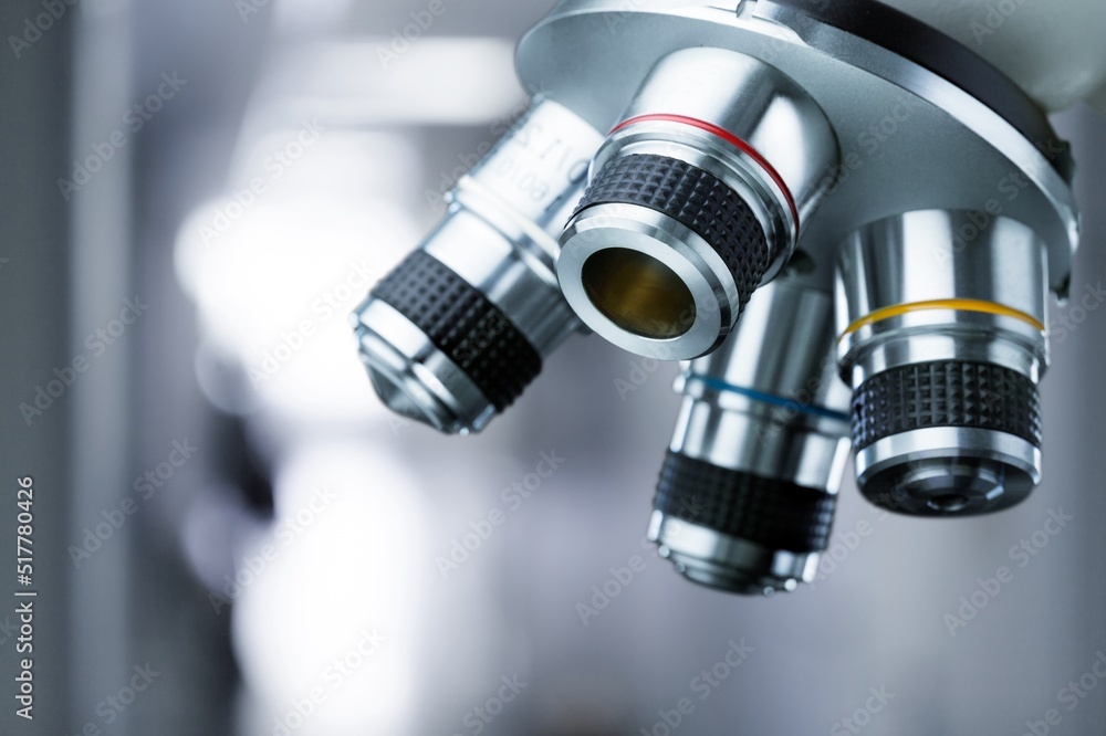 scientist prepare blood sample for research on microscope. Placing blood sample on slide. Science and medicine concept. scientist prepare blood sample for research on microscope. Placing blood sample on slide. Science and medicine concept.