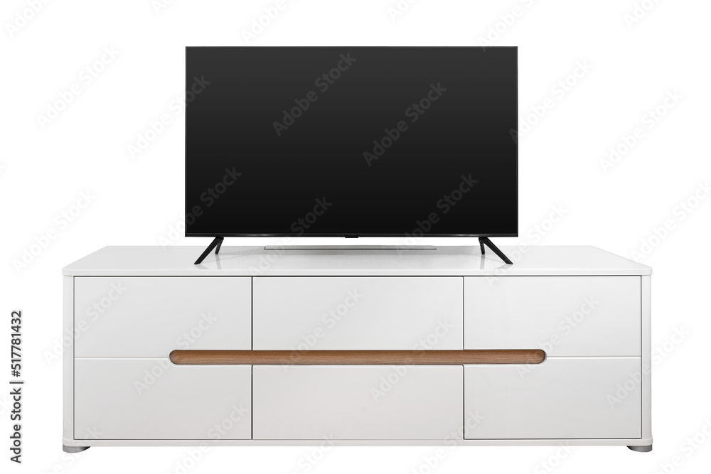Flat screen TV on a white nightstand isolated on a white background Flat screen TV on a white nightstand isolated on a white background