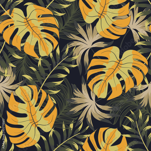 Abstract seamless tropical pattern with bright plants and leaves on a black b...