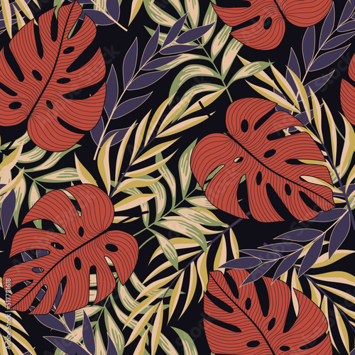 Abstract seamless tropical pattern with bright plants and leaves on a dark ba...