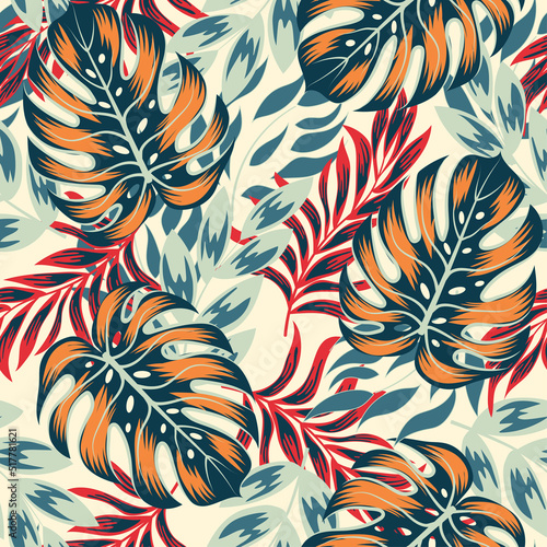 Abstract seamless tropical pattern with bright plants and leaves on a beige b...