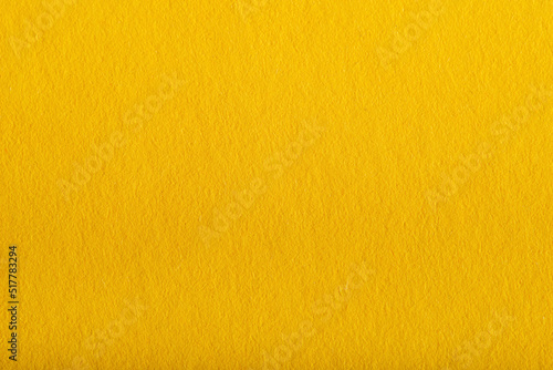macro texture of colored yellow paper