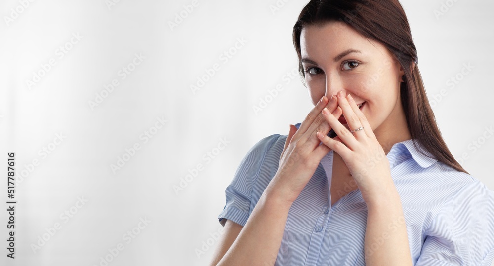 Portrait of beautiful young female or woman looking happy and confident. Concept: having a secret. Portrait of beautiful young female or woman looking happy and confident. Concept: having a secret.