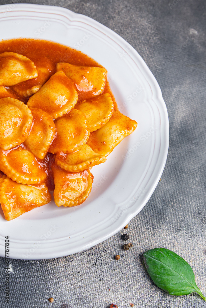 ravioli stuffed meat pasta tomato sauce fresh dish healthy meal food snack diet on the table copy space food background rustic top view ravioli stuffed meat pasta tomato sauce fresh dish healthy meal food snack diet on the table copy space food background rustic top view