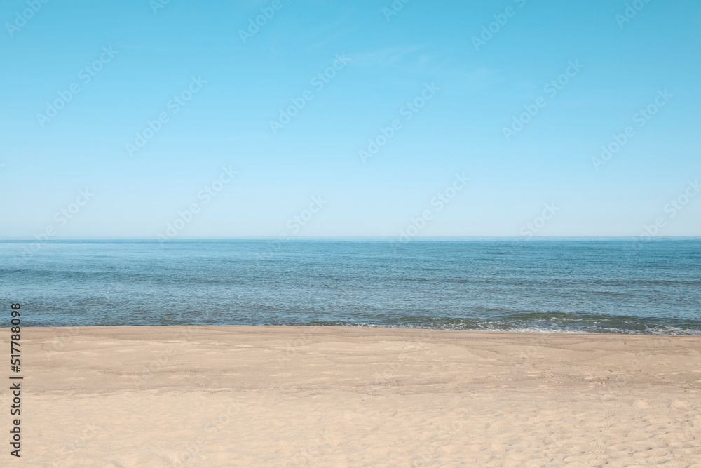 Picturesque view of sandy beach near sea