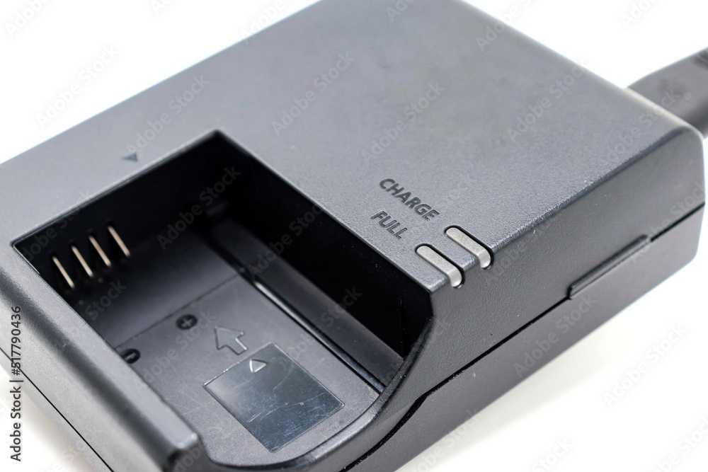 battery charger for photo camera on white background battery charger for photo camera on white background