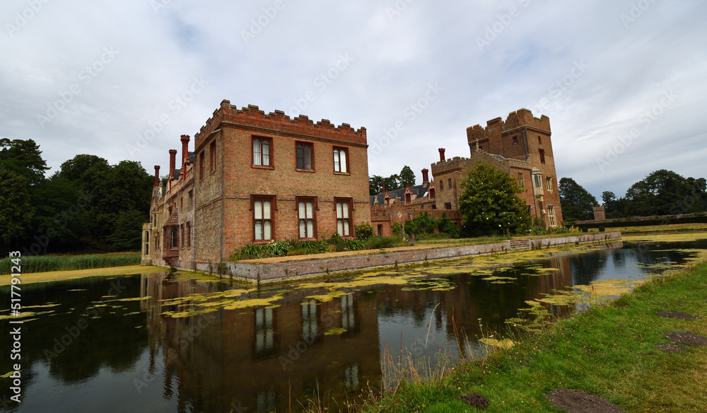 Oxburgh Hall with moat and reflections