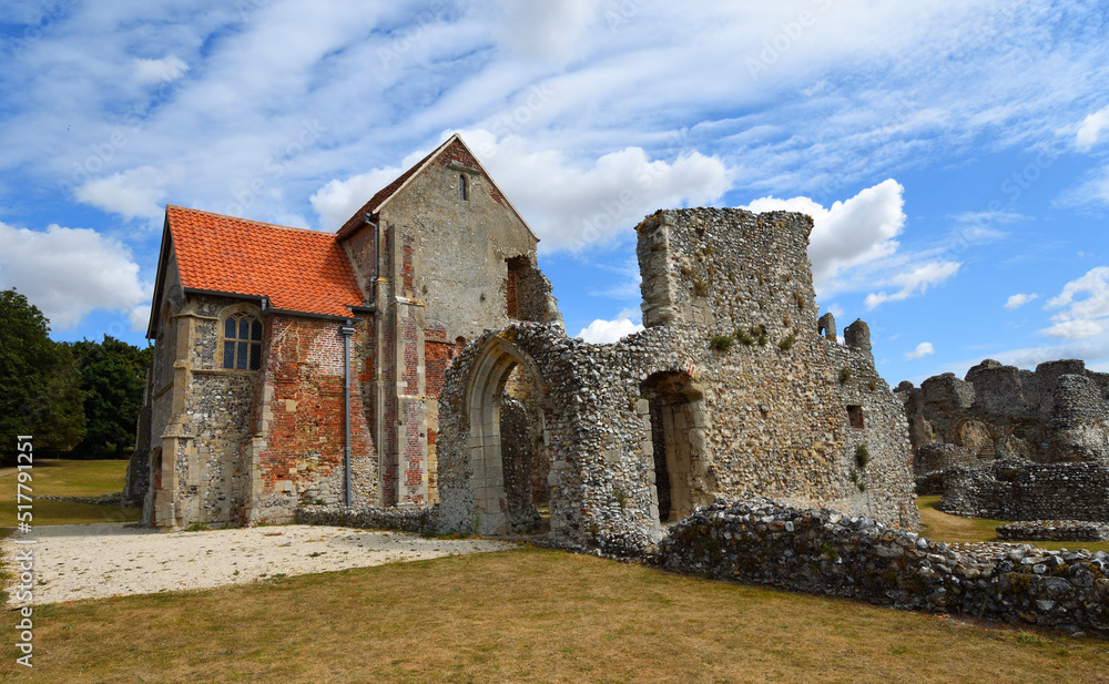 Castle Acre Priory on a sunny day.
