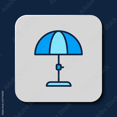 Filled outline Sun protective umbrella for beach icon isolated on blue background. Large parasol for outdoor space. Beach umbrella. Vector
