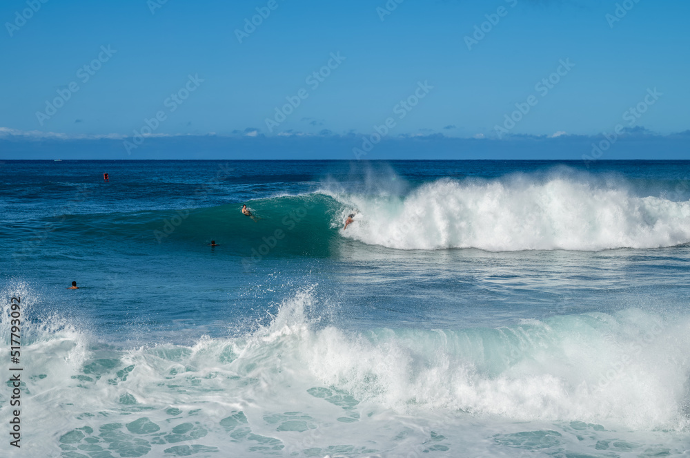 Body Surfer riding a Hawaiian Wave at Point Panic Beach.