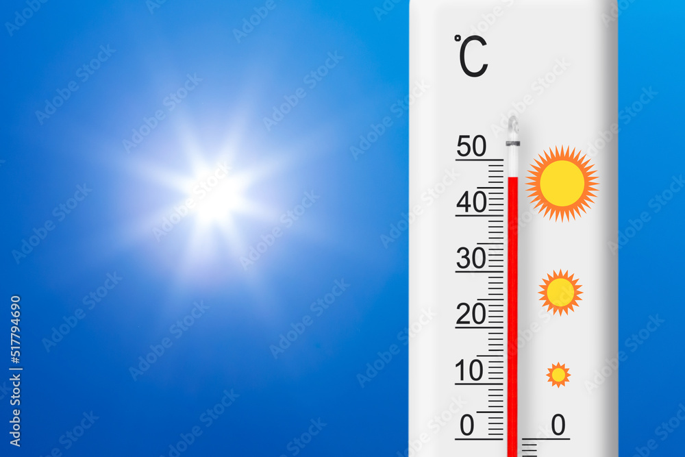 Celsius scale thermometer shows plus 47 degrees . Yellow sun in blue sky. Summer heat Photos