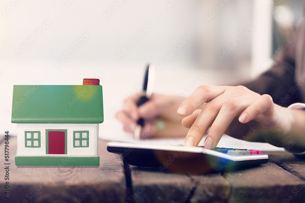 Fototapeta premium Business person taking real estate quotes
